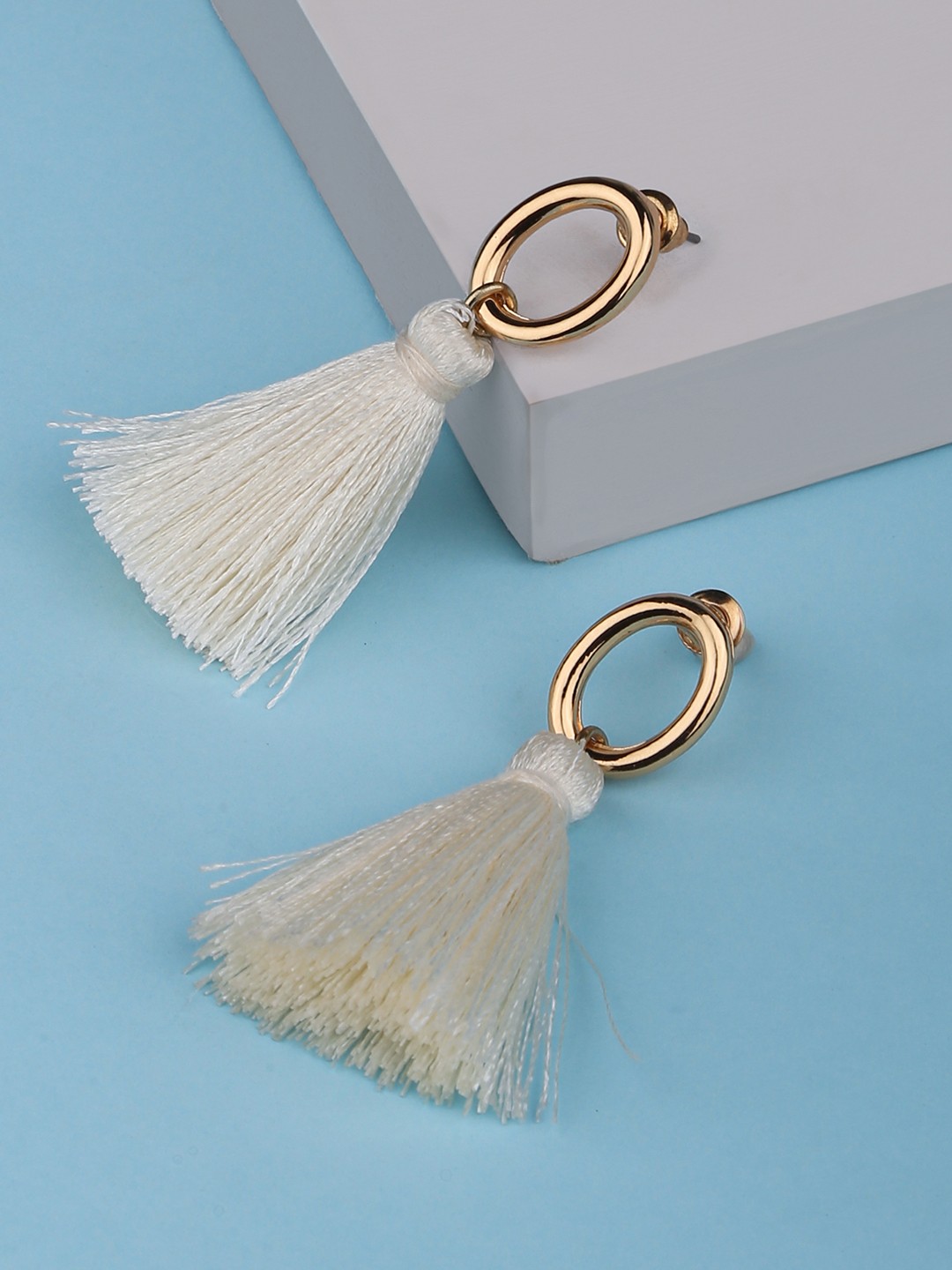 White tassel earrings with hollow stud