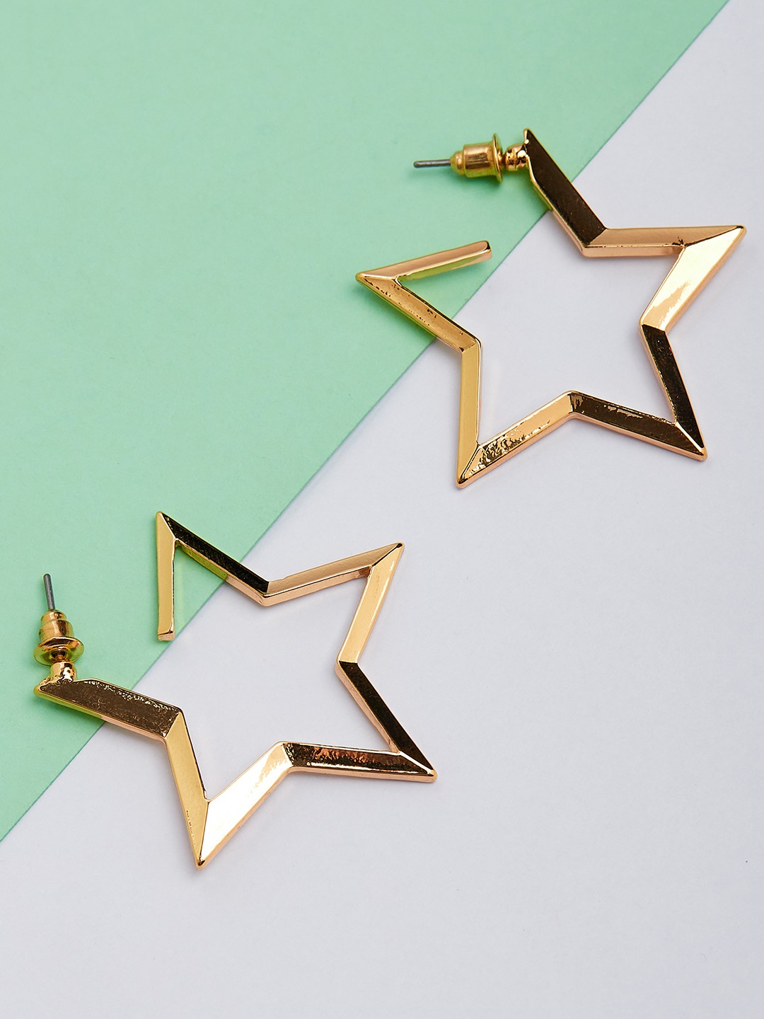 Gold toned Star shaped hoop earrings