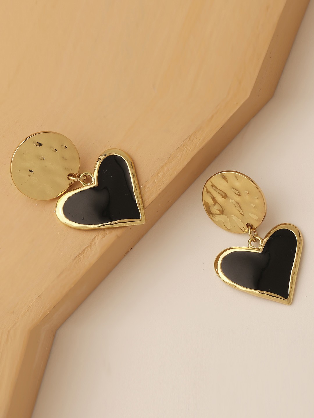 Gold tonned black heart drop stud earrings