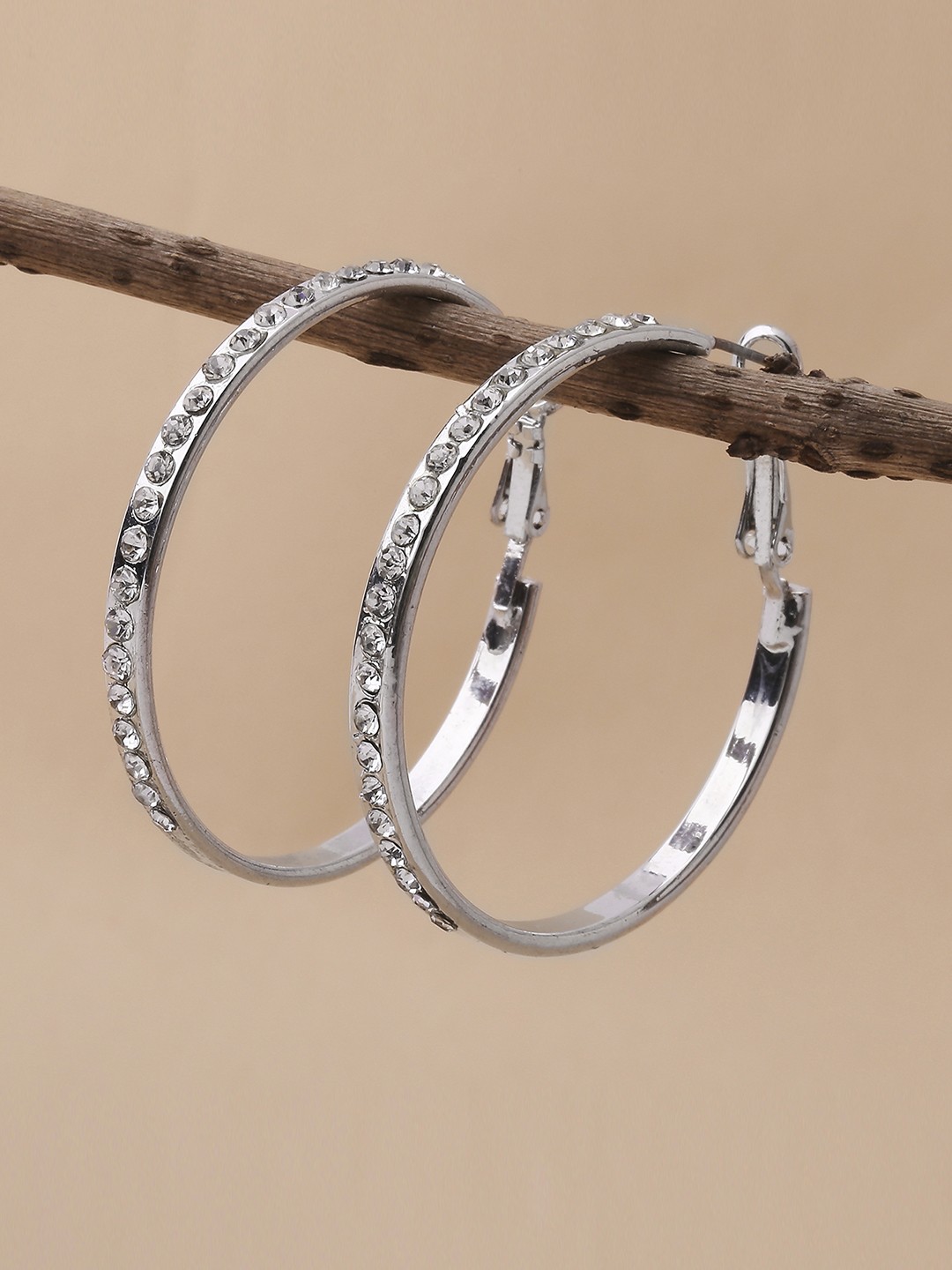 Silver toned crystal studded hoop earrings