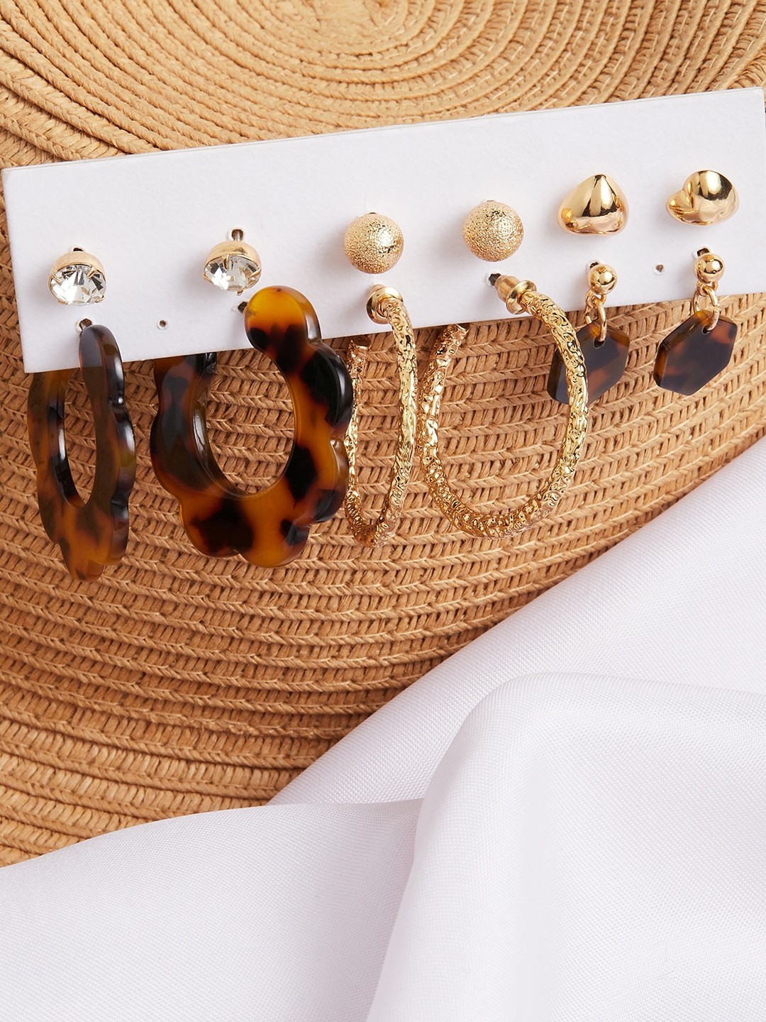 Set of 6 Gold toned 2 hoops and 4 studs earrings