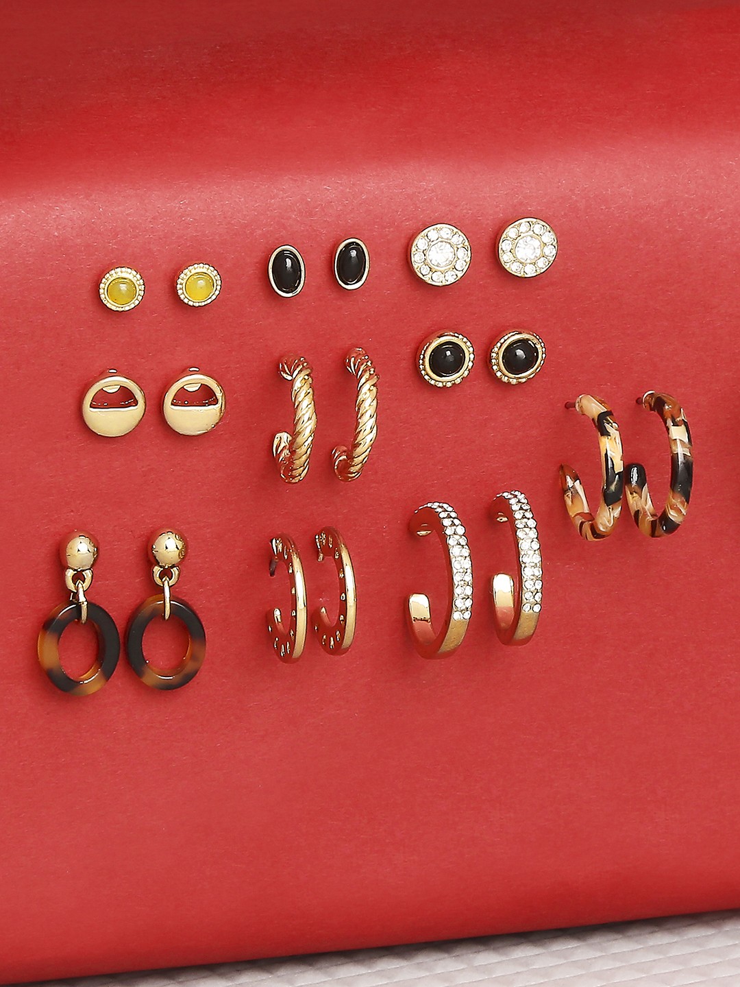 Pack of 10 Gold plated and acetate earring, 6 stud and 4 mini hoops