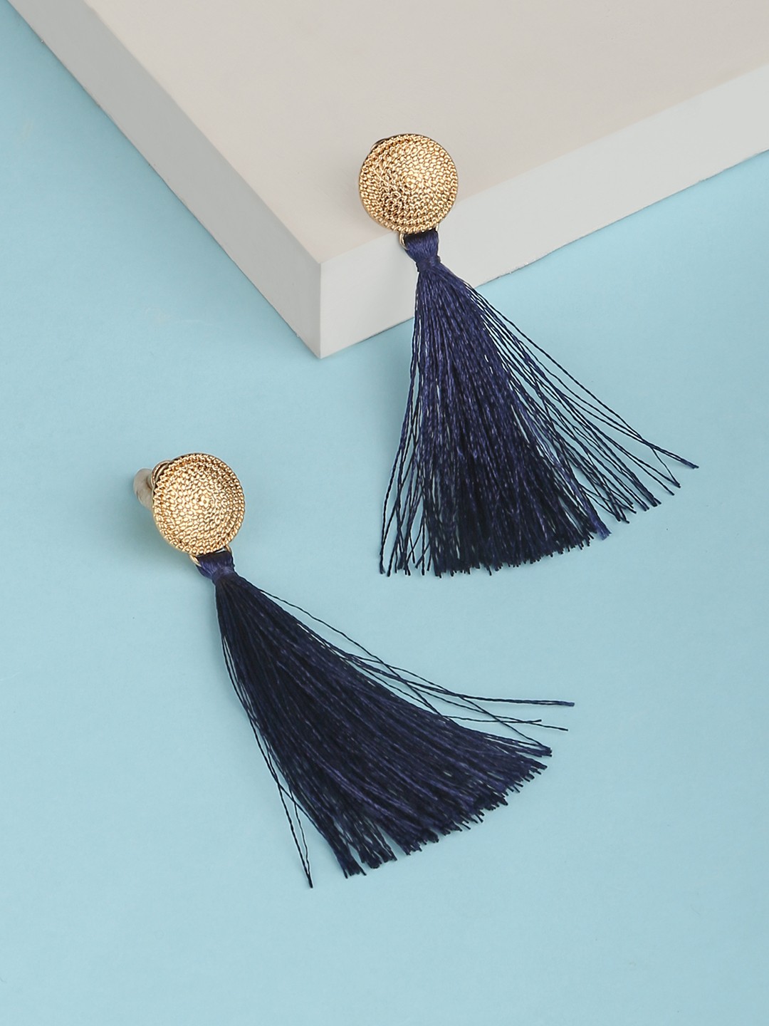 gold tonned Navy blue tassel earrings with circular top