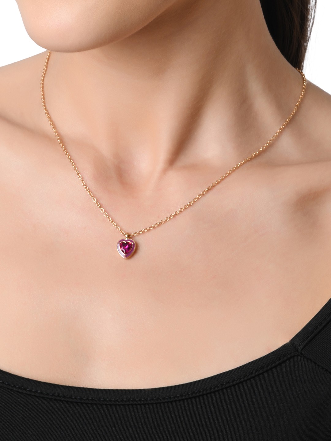 Gold toned set of 2 necklace with pink stone heart pendant and pink heart hoop earrings