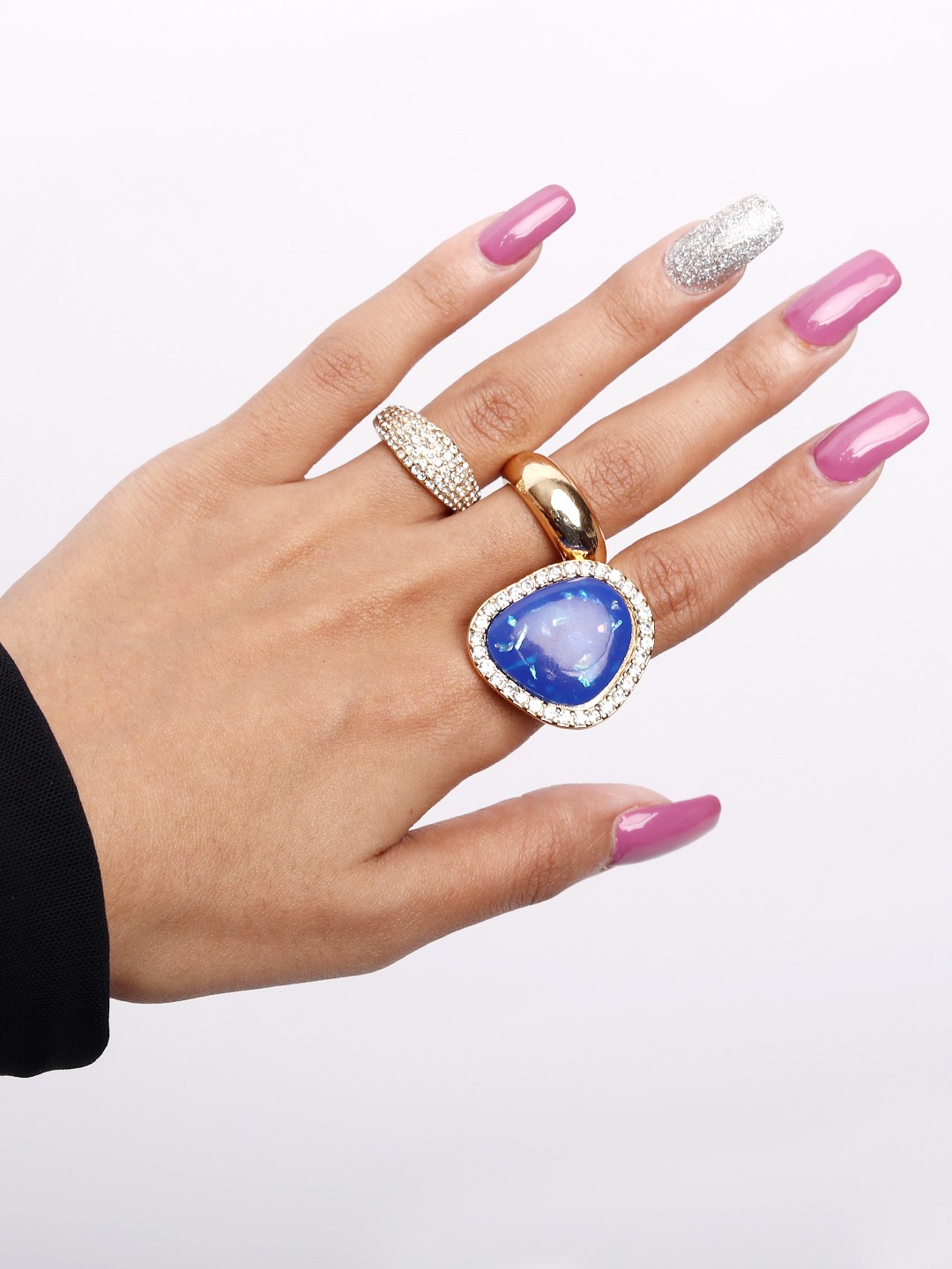 Set of 3 crystal studed rings with blue glass stone