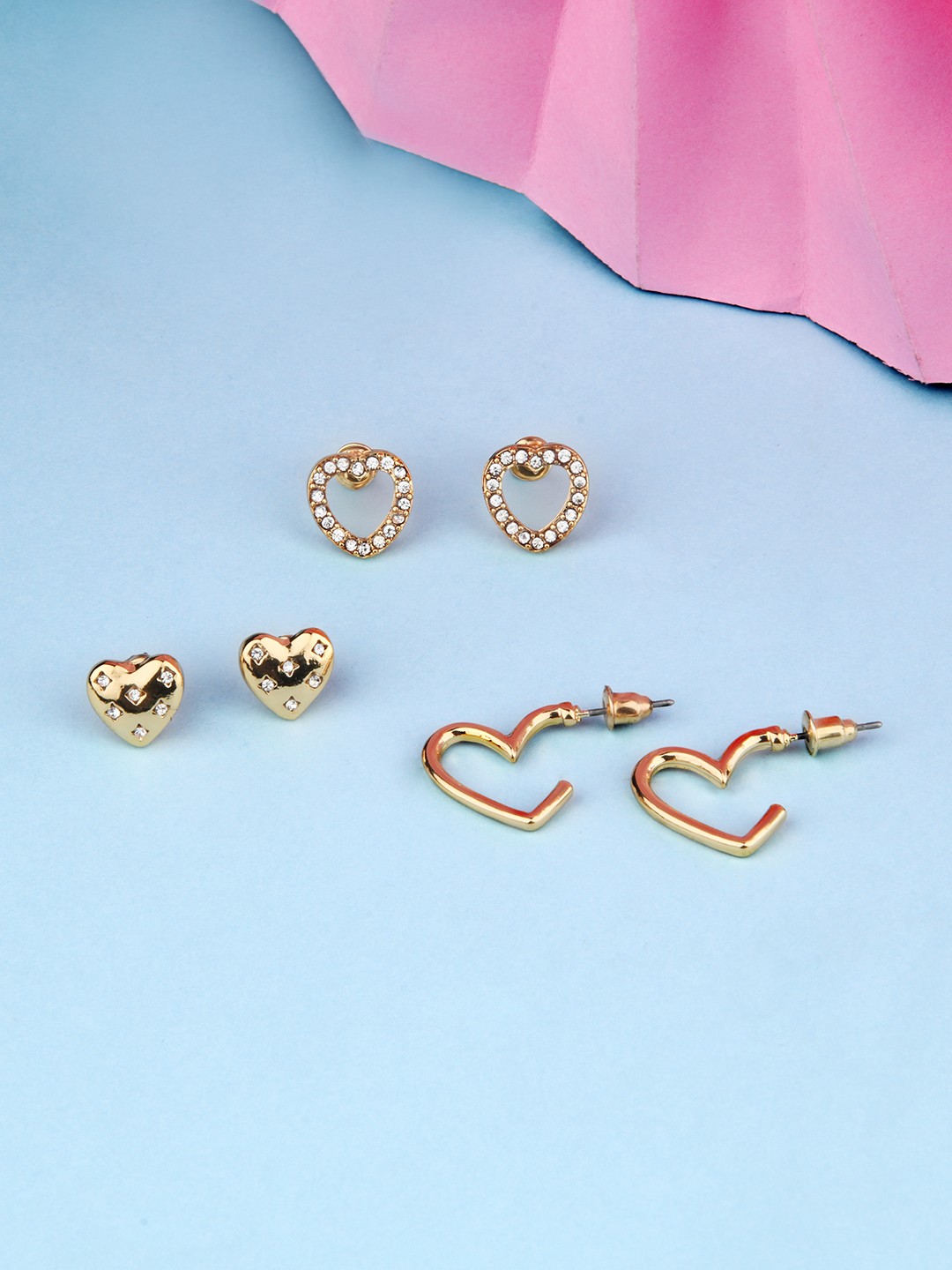 Gold toned set of 3 heart stud earrings