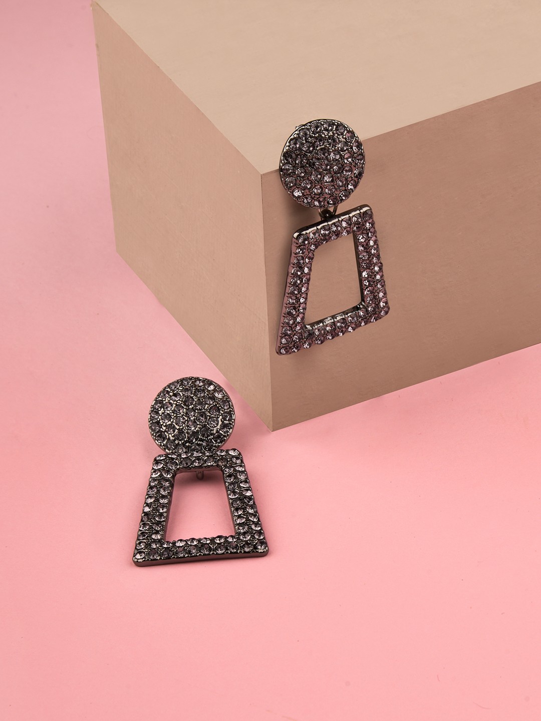 black toned crystal studed drop earrings